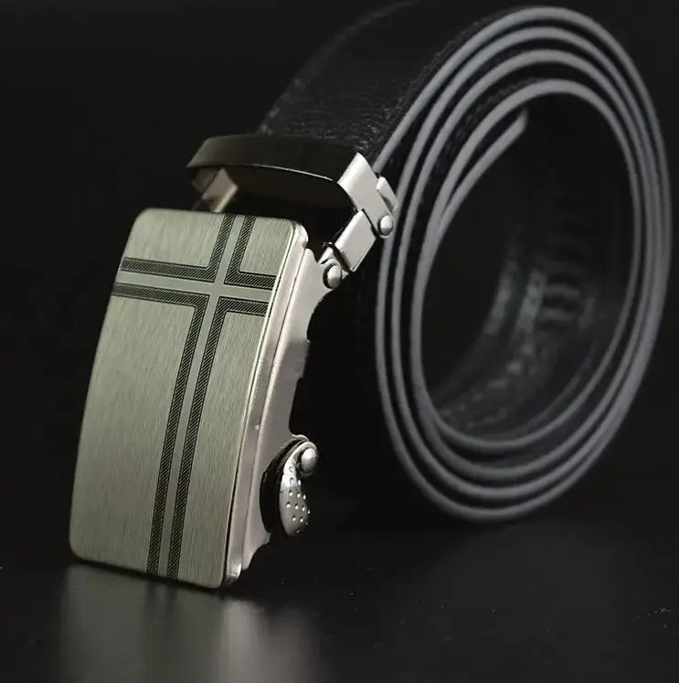 Close-up of the refined automatic buckle on a black belt.