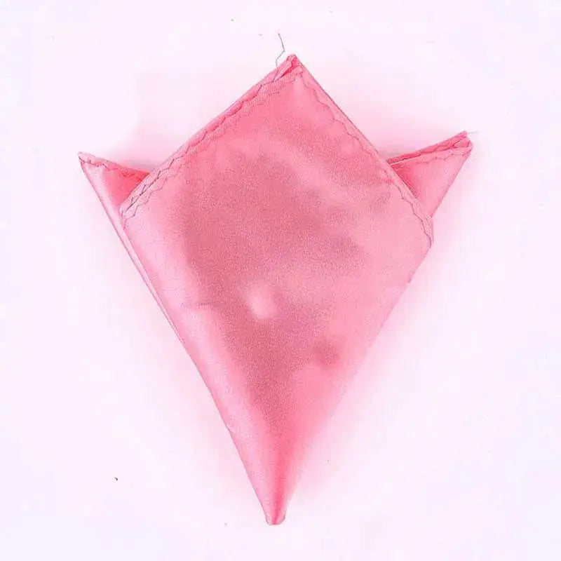 Silken pocket square in classic cream, enhances any suit with sophistication.