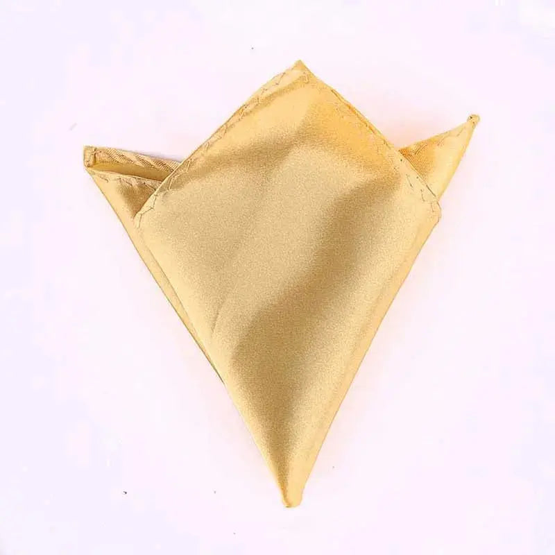 Elegant pocket square in soft coral, ideal for summer weddings.