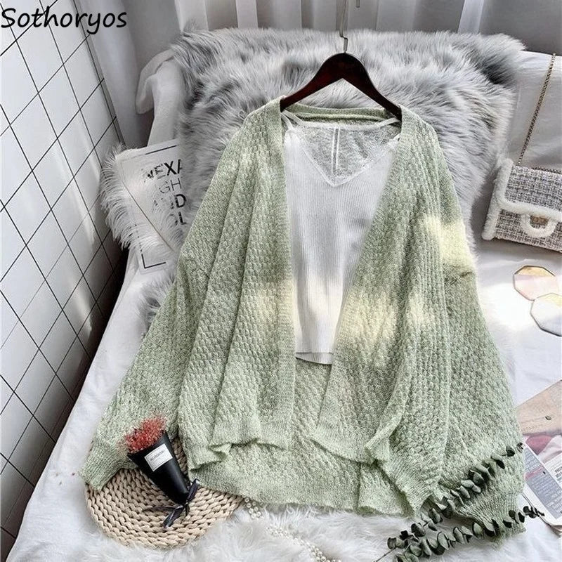 Lightweight cotton blend Breeze Whisper Cardigan in soft pastel color, perfect for spring layering.