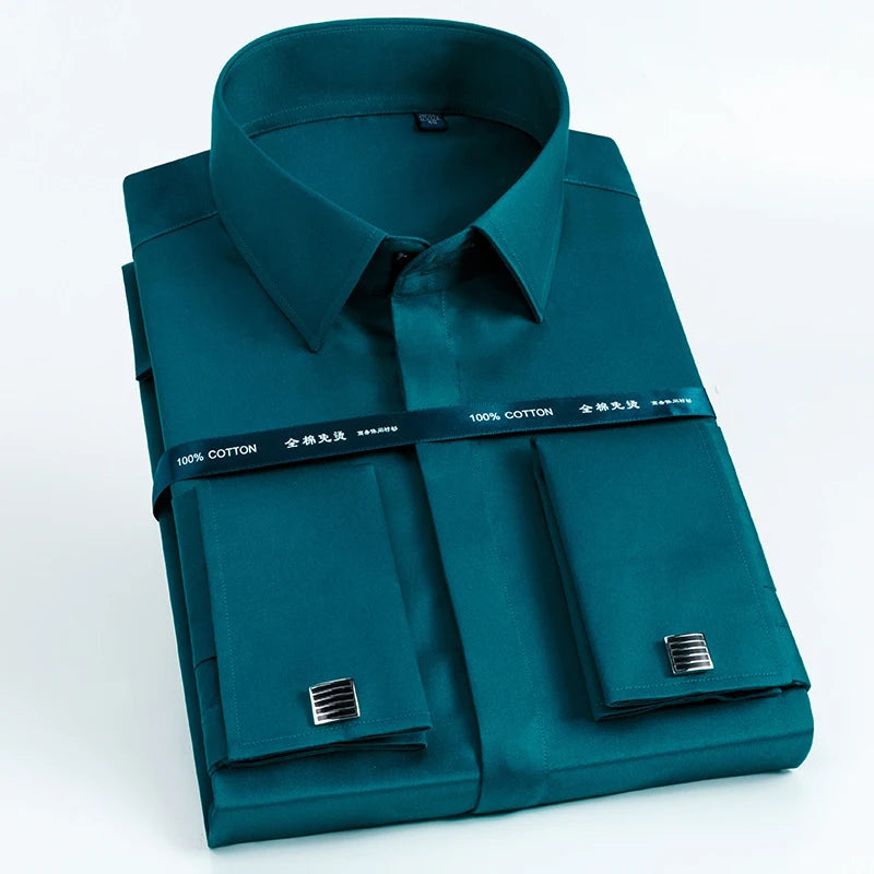 Businessman in mercerized cotton dress shirt fastening French cuffs with silver cufflinks