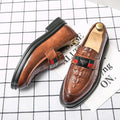 Detailed shot of crocodile embossed leather loafer showing premium craftsmanship