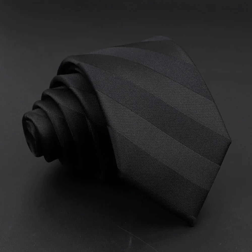 Versatile jacquard stripe tie featuring contemporary width and classic design