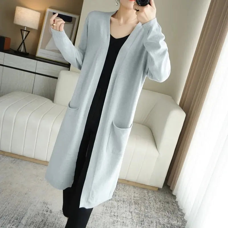Model enjoying a brisk morning in the Cashmere Embrace cardigan, radiating comfort.