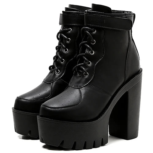 Modern black lace-up ankle boots with bold buckle hardware and durable construction