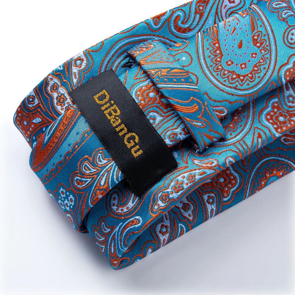 Premium silk blend necktie featuring intricate paisley design with matching handkerchief