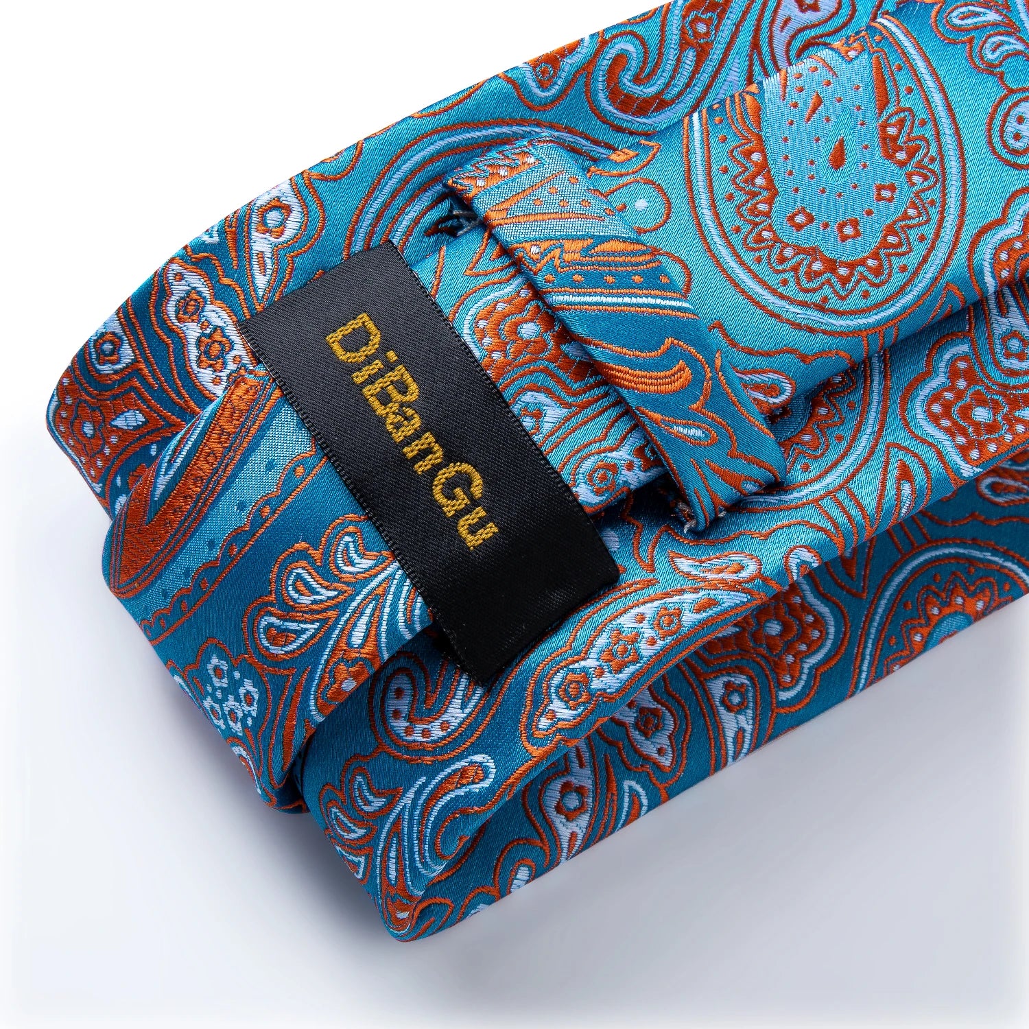 Premium silk blend necktie featuring intricate paisley design with matching handkerchief