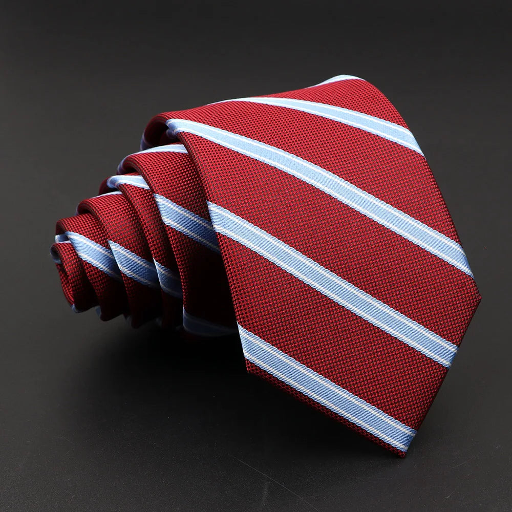 Refined narrow tie featuring classic stripes and dimensional jacquard texture