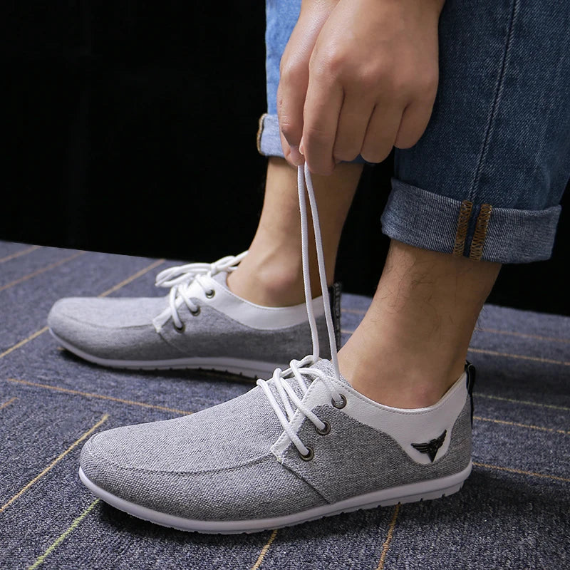Side view of lightweight Breathe Easy Canvas Sneakers with durable rubber outsoles.