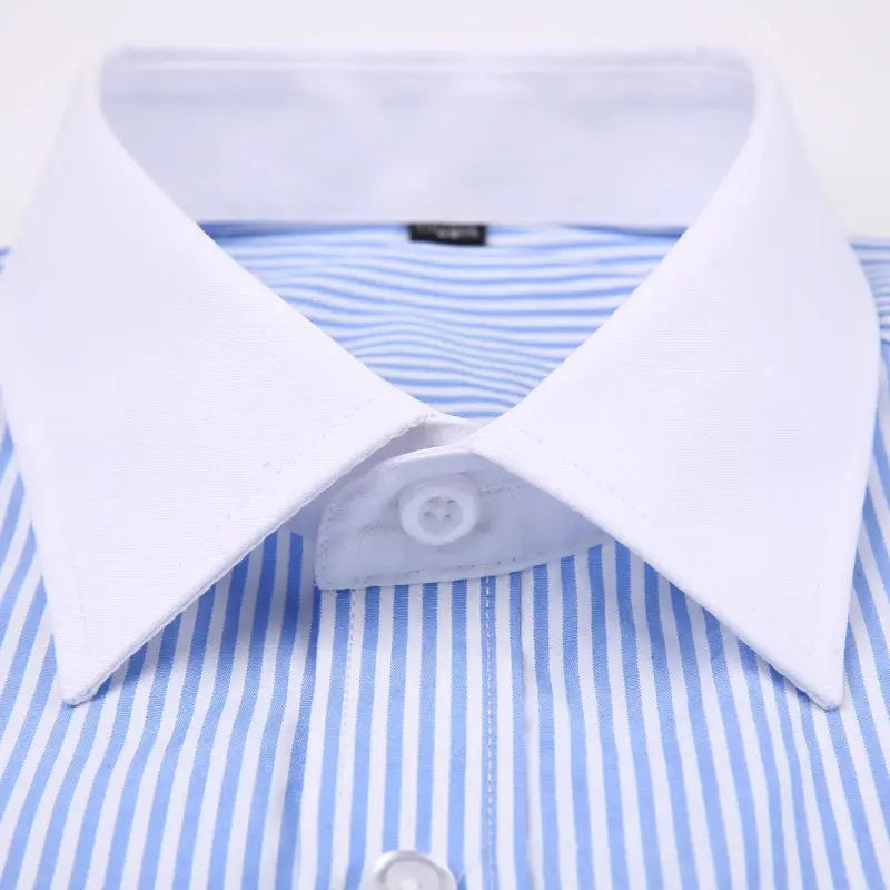 Close-up of the smooth cotton-polyester blend fabric of the striped dress shirt.