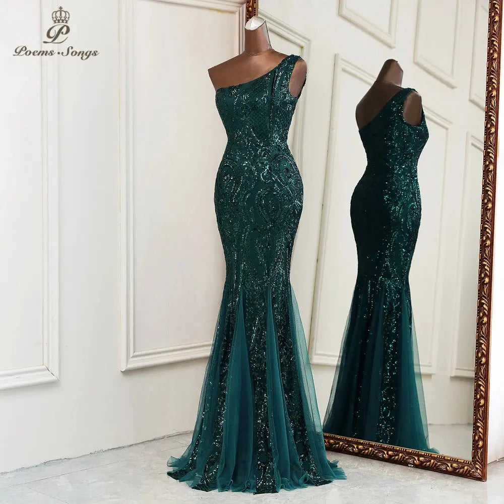 Model wearing the Captivate the Gala gown, showcasing its stunning silhouette and one-shoulder design.