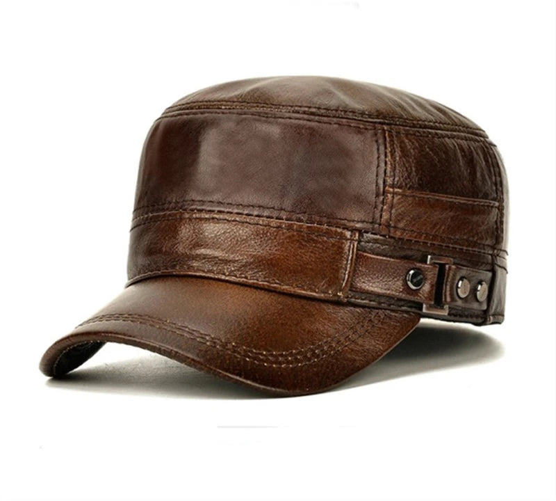 Flat lay of the Autumn Air leather cap with autumn leaves, highlighting seasonal style.