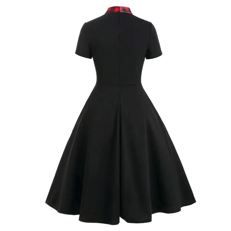 A-line silhouette of the red plaid midi dress, flattering fit for all figures.