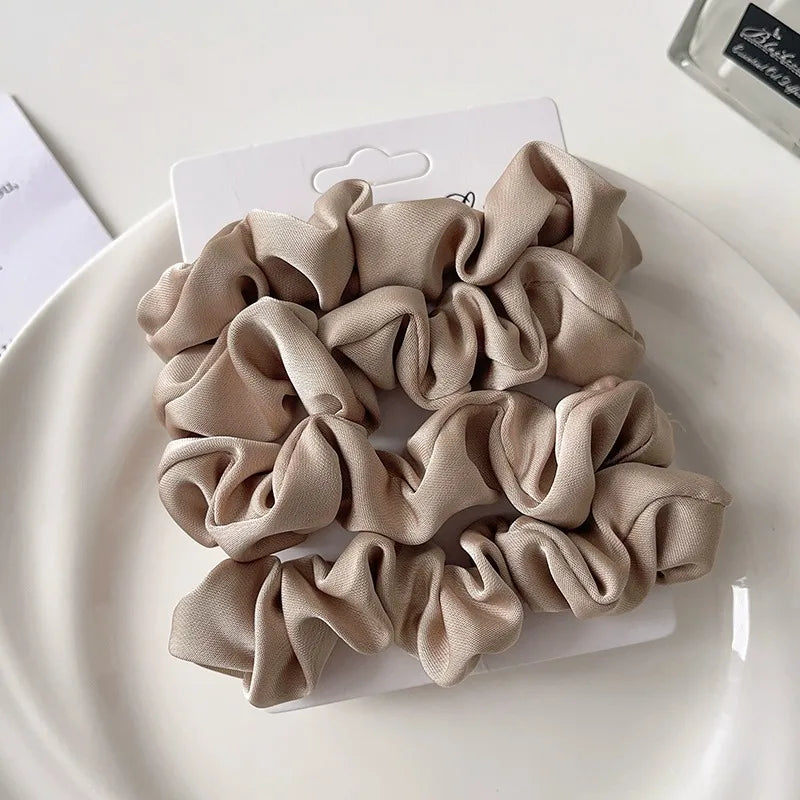 Timeless satin hair accessories elevating everyday looks with royal treatment