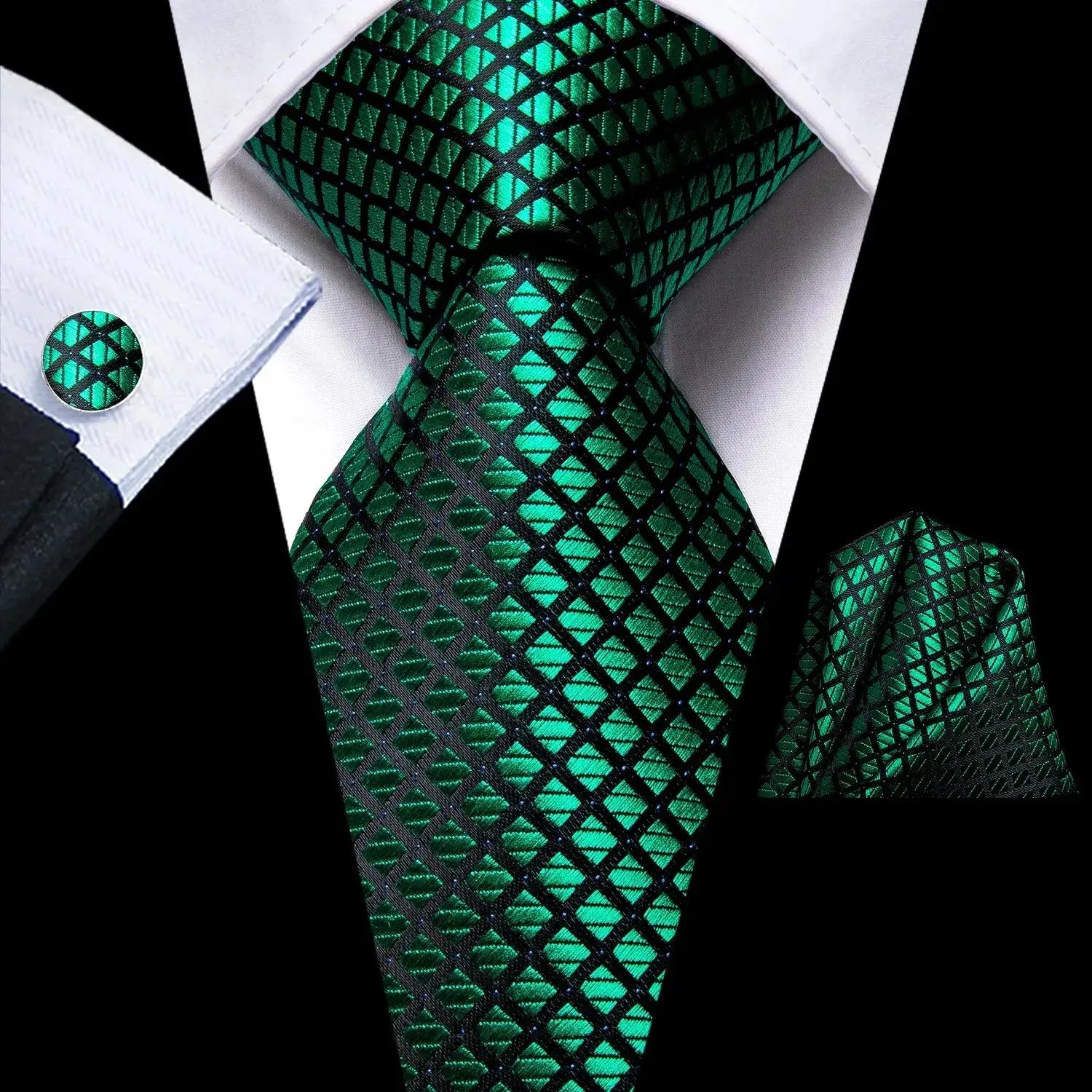 Detail shot of the silk tie's luxurious fabric and craftsmanship.