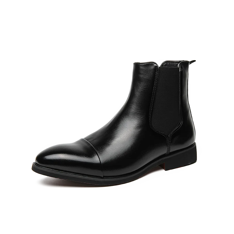 Waterproof ankle boots styled with tailored trousers for office wear