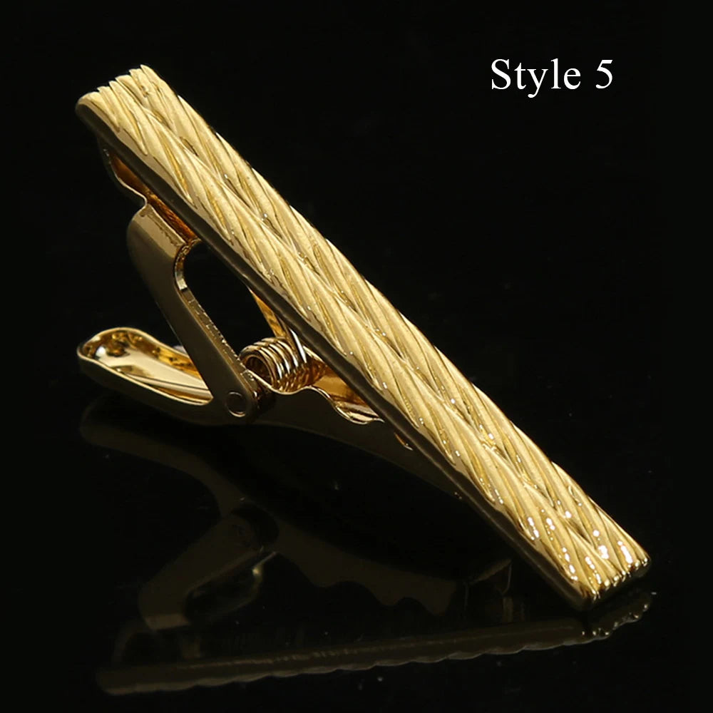 Men's business accessory: rose gold tie clip for style.