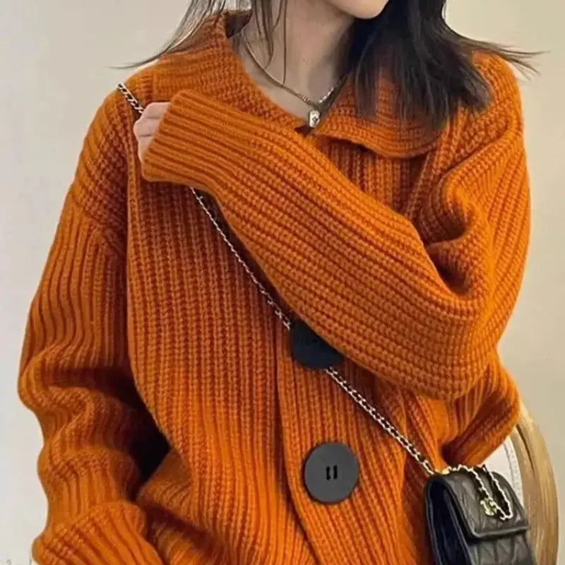 Loose-fitting Autumn Whisper Cardigan, ideal for layering over autumn outfits.