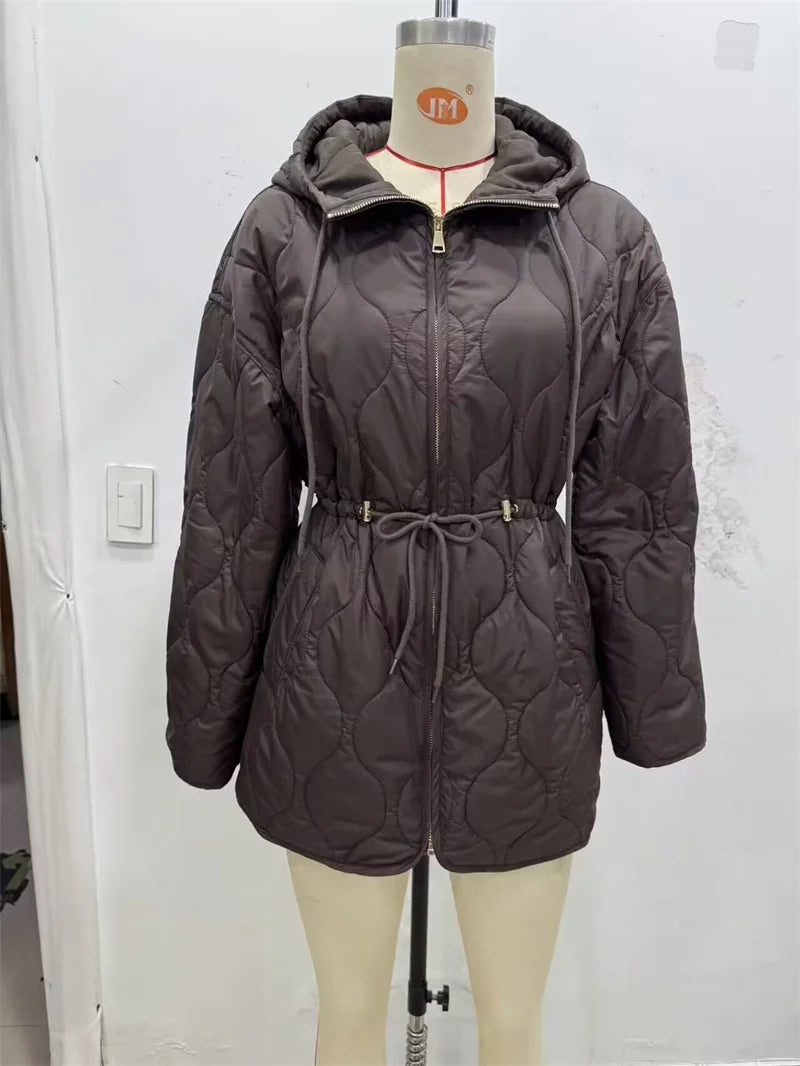 Autumn Whisper coat draped elegantly, highlighting its cozy and protective features.