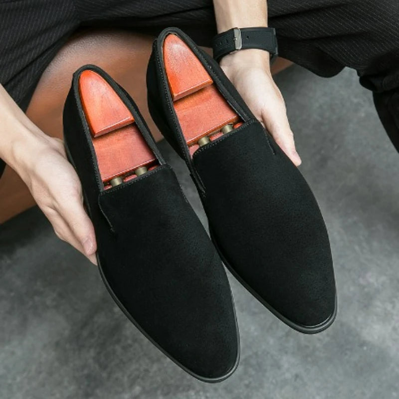 Luxurious pointed toe loafers in buttery suede with distinctive red contrast sole