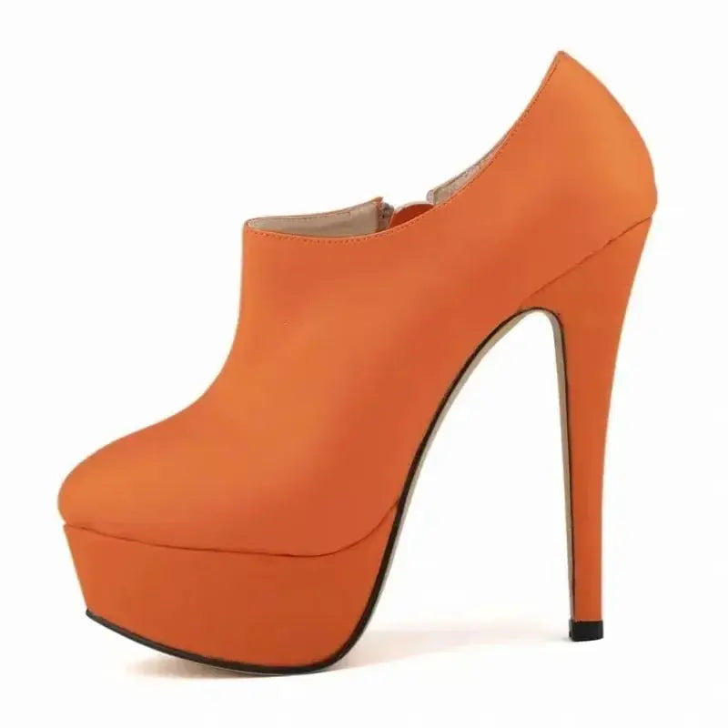 Black leather stiletto pumps with a shiny finish and 14cm heels.