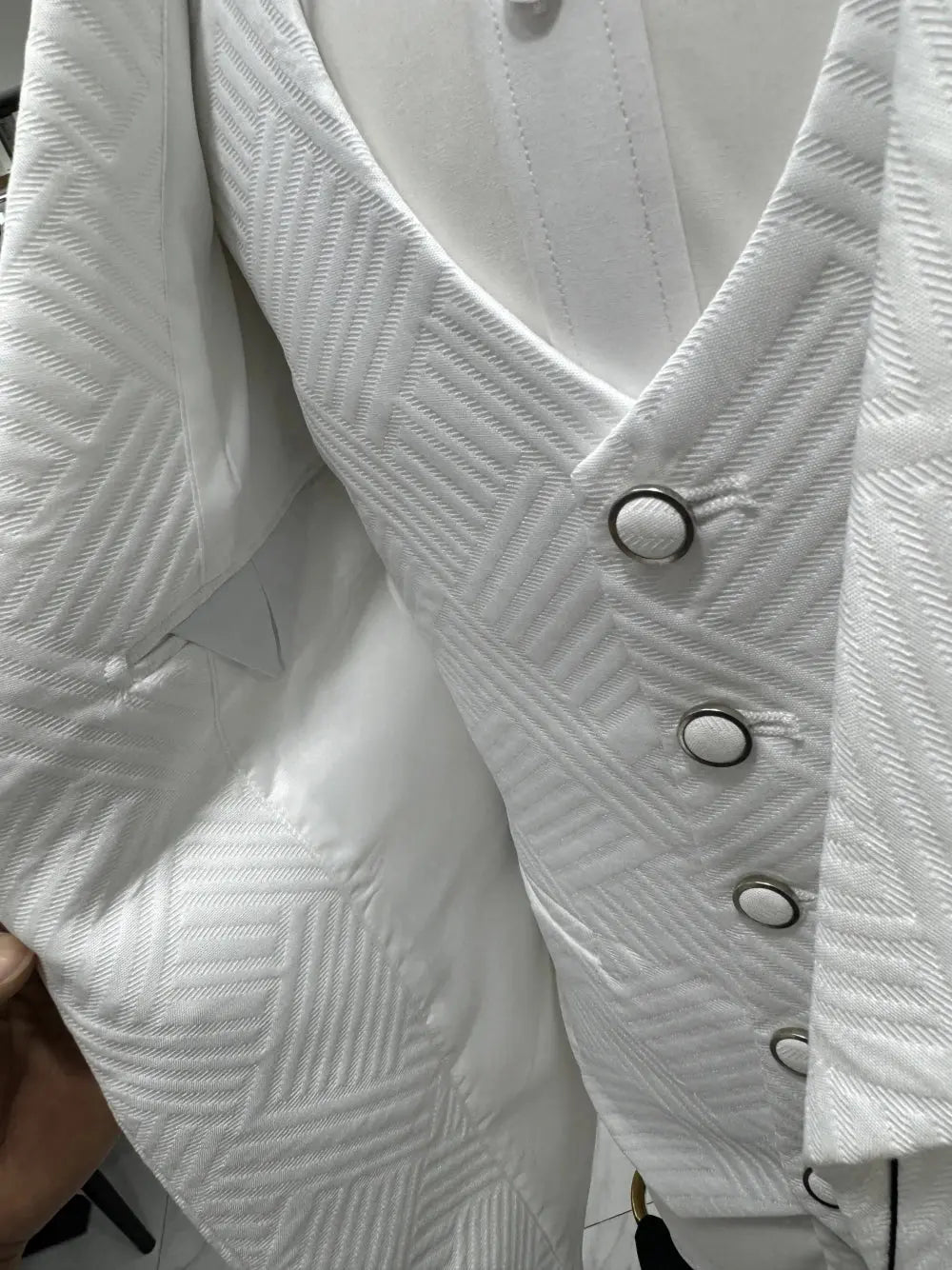 Full view of the white jacquard suit, perfect for upscale events and weddings.