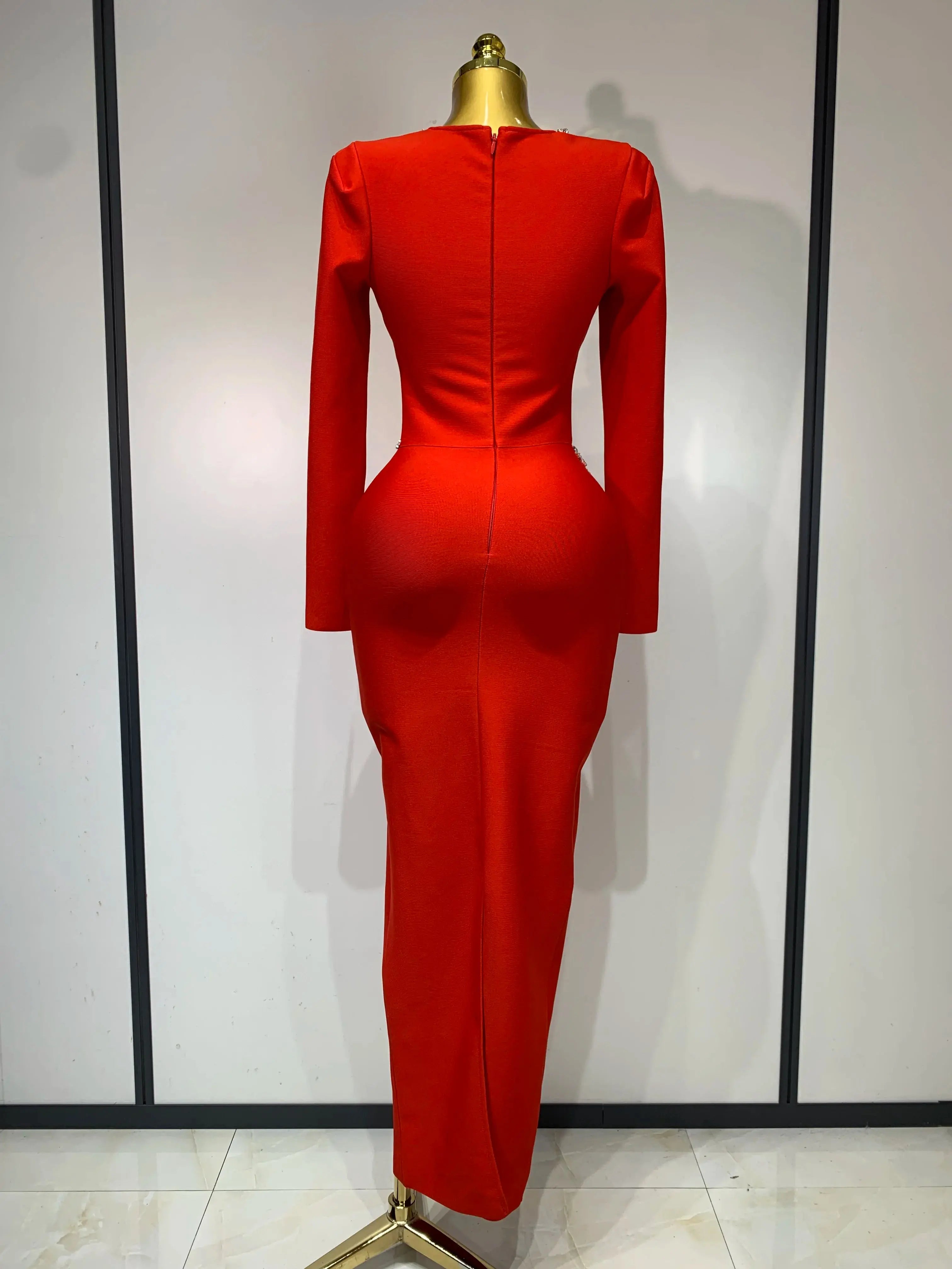 High-stretch polyester blend red dress, perfect for comfortable movement at upscale events.