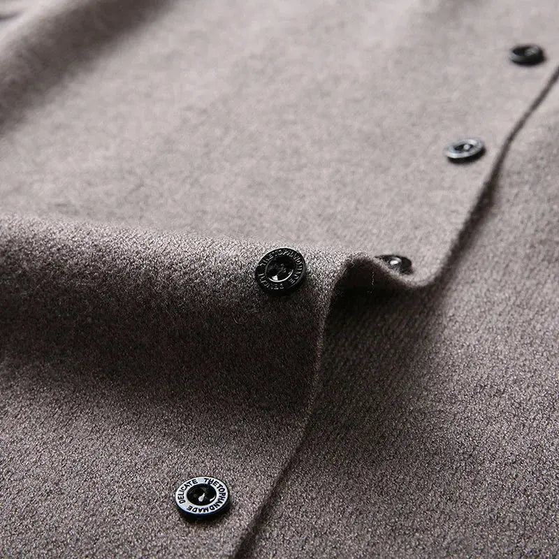 Model wearing the Autumn Whisper cardigan, demonstrating its all-day comfort and relaxed fit in an urban setting.