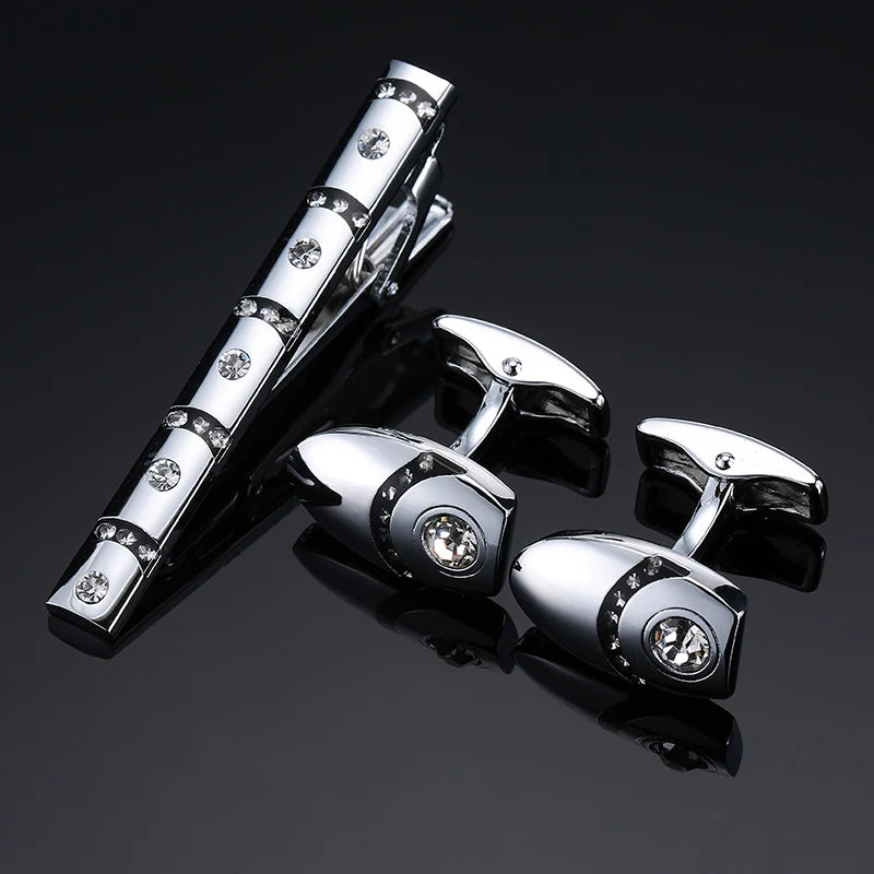 Detailed tie clip in copper with crystal embellishments, perfect for formal occasions.