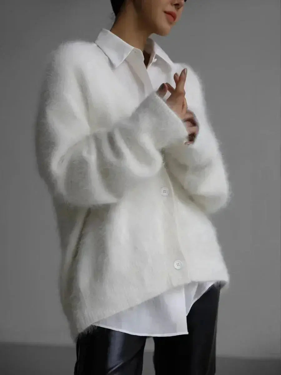 Elegant women's outerwear with button details for added style.