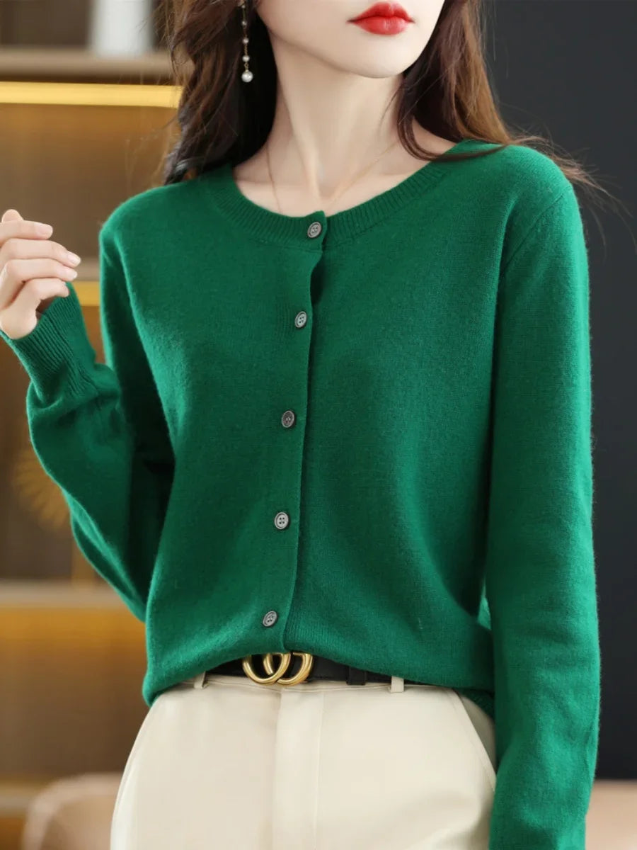 Model wearing the Autumn Whisper Cardigan, styled for a casual brunch look.