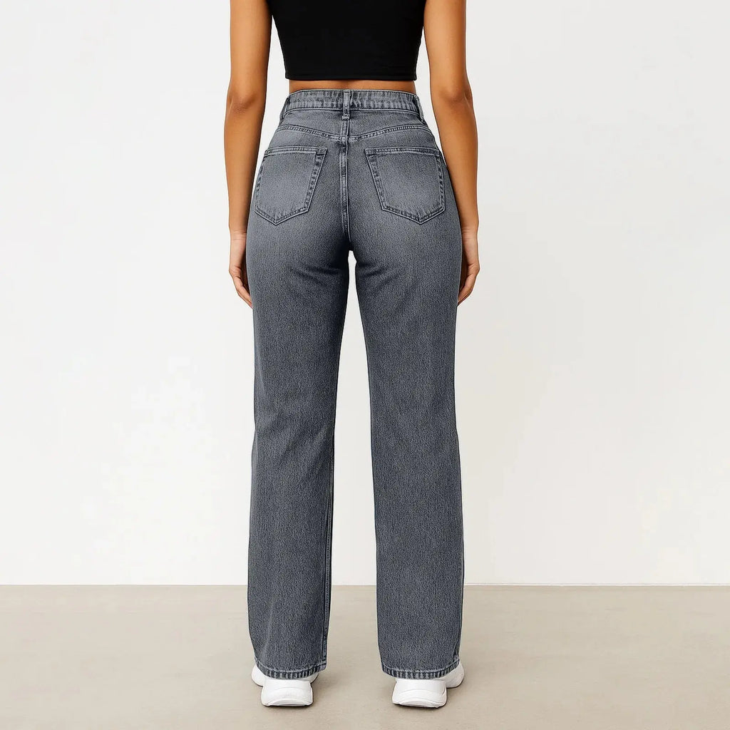 Elastic waist detail of light blue denim jeans for ultimate convenience.
