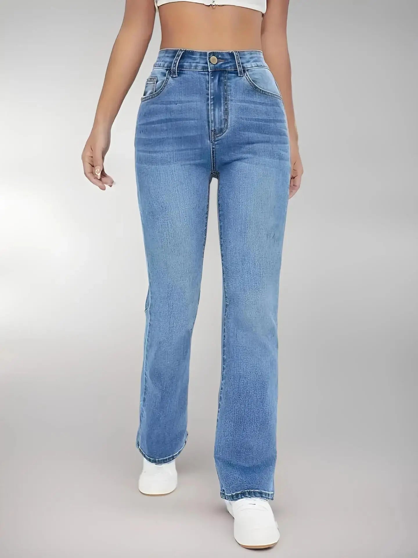 Full-length view of high-waist jeans, perfect for casual chic outfits from day to evening.