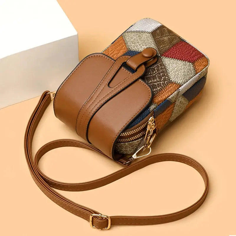 Vintage-inspired sequined plaid purse with PU leather exterior and crossbody strap for hands-free carrying