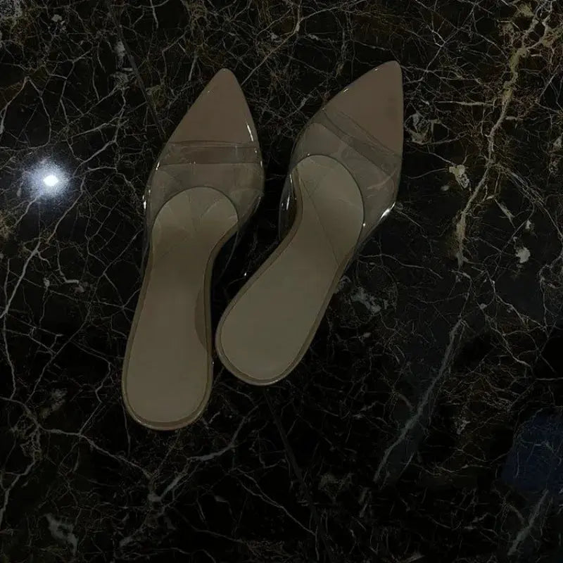 Back view of Midnight Soirée Heels featuring the durable rubber outsole for enhanced longevity.