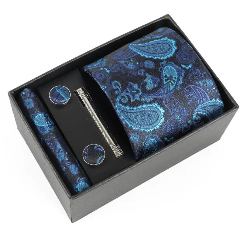 Close-up of the intricate jacquard pattern on the silk tie.