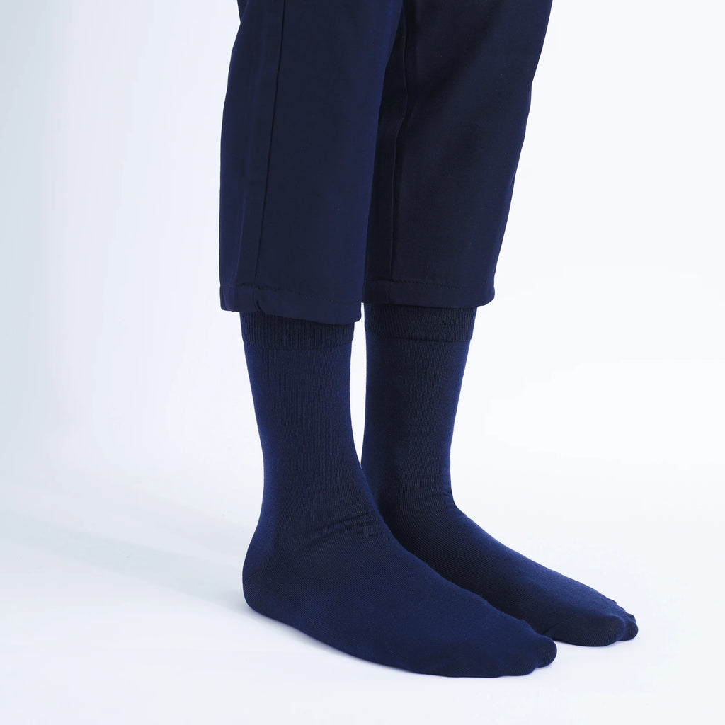 High-quality black socks designed for a snug, stay-put fit without squeezing.