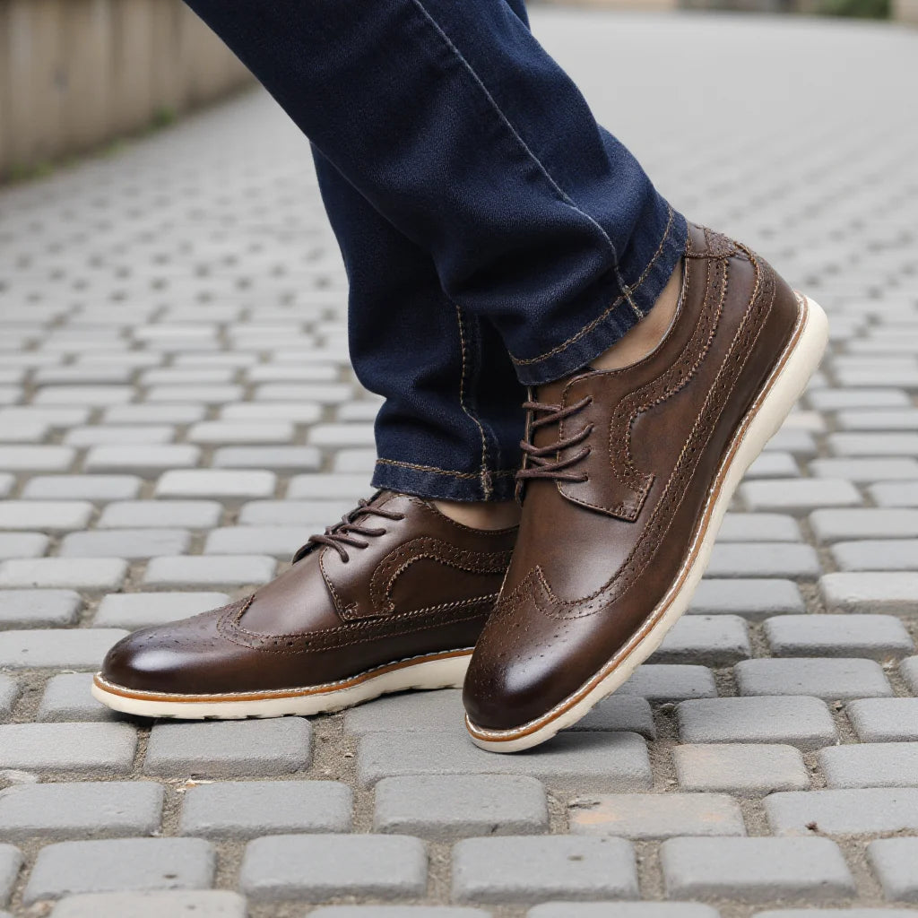 Classic men's brogue footwear in brown featuring heritage design with modern breathable construction