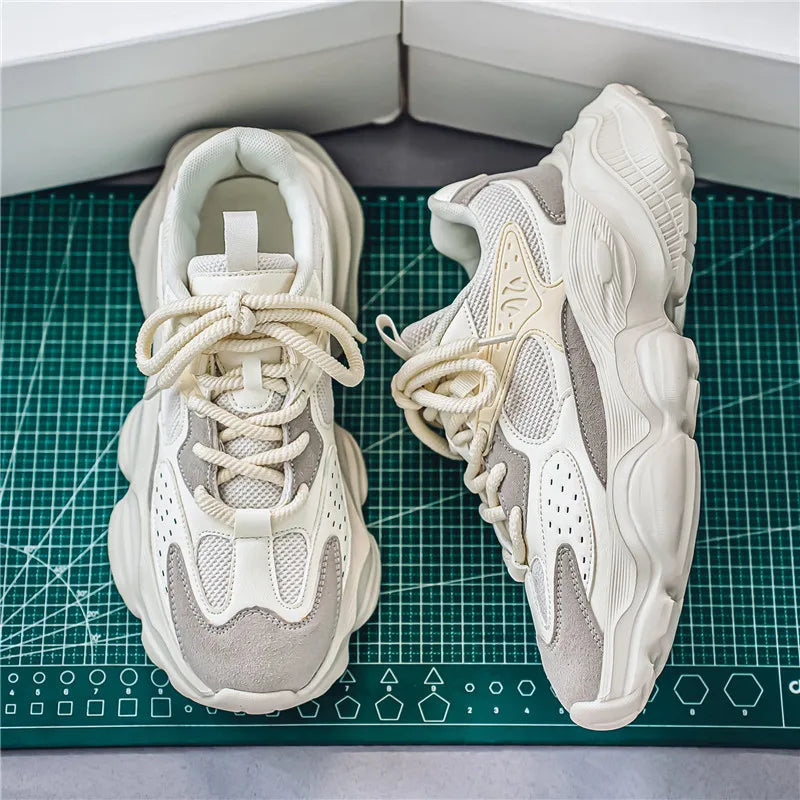 Top view of breathable mesh men's sneakers showing ventilation design and lace-up closure