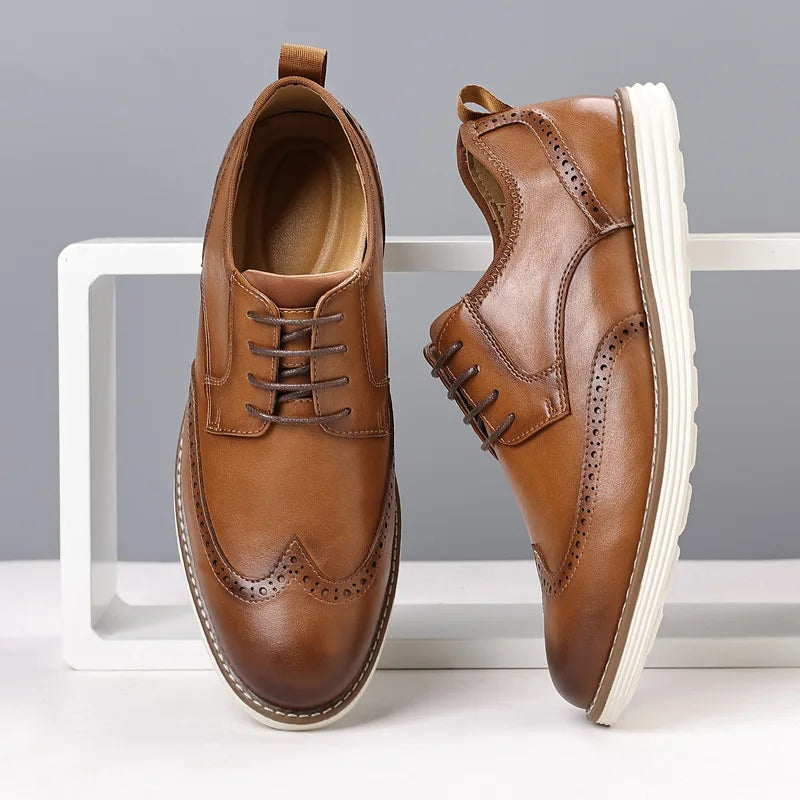 Elegant lace-up closure on polished black oxfords for formal occasions.