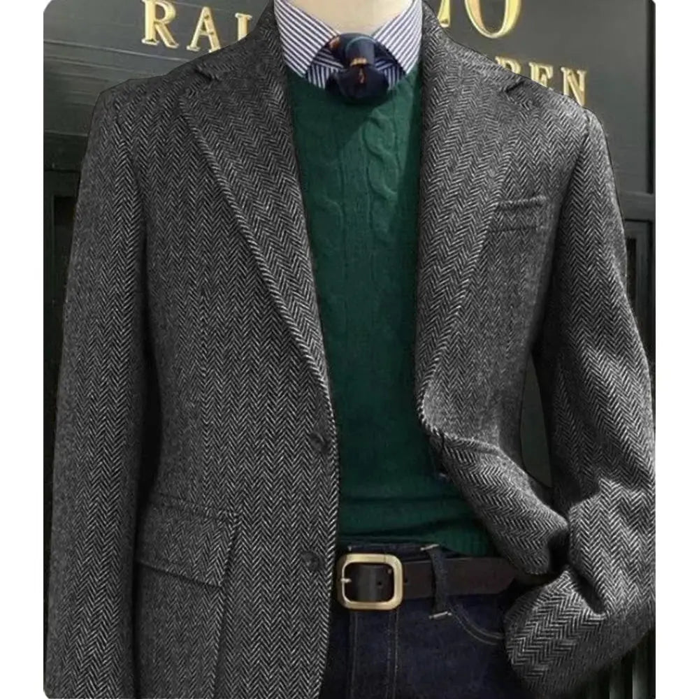Flat lay of herringbone blazer with accessories, illustrating stylish menswear options.