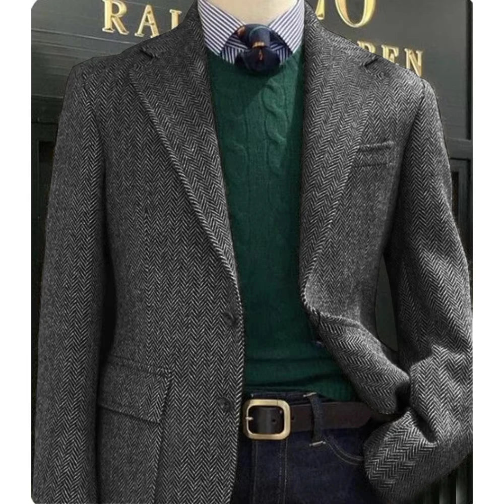 Stylish herringbone suit jacket, enhancing silhouette with a sleek, modern fit for professional settings.