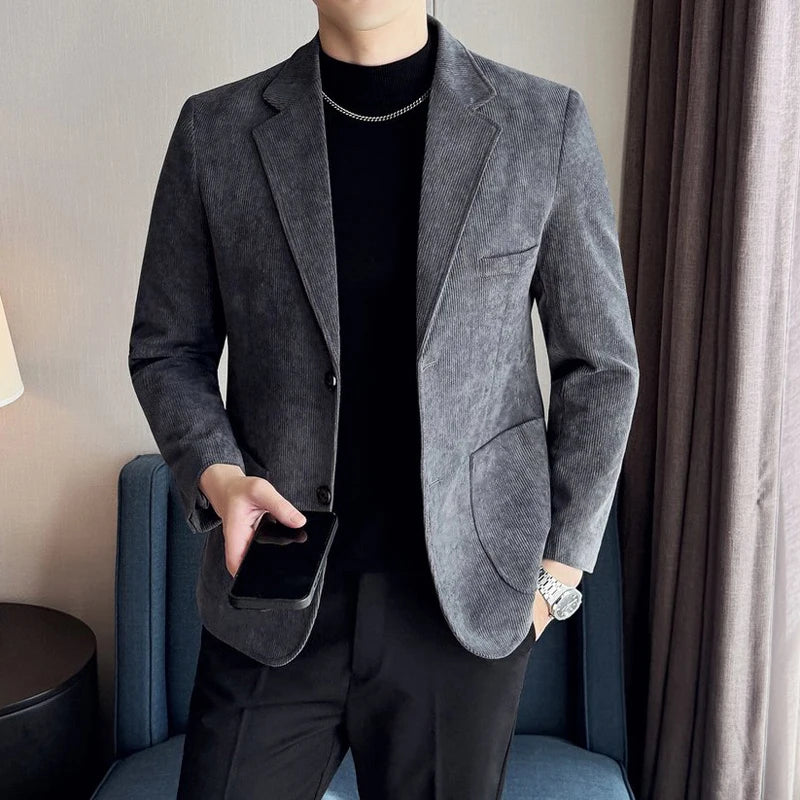 Flat lay of the Autumn Whisper corduroy blazer, highlighting its versatile styling options.