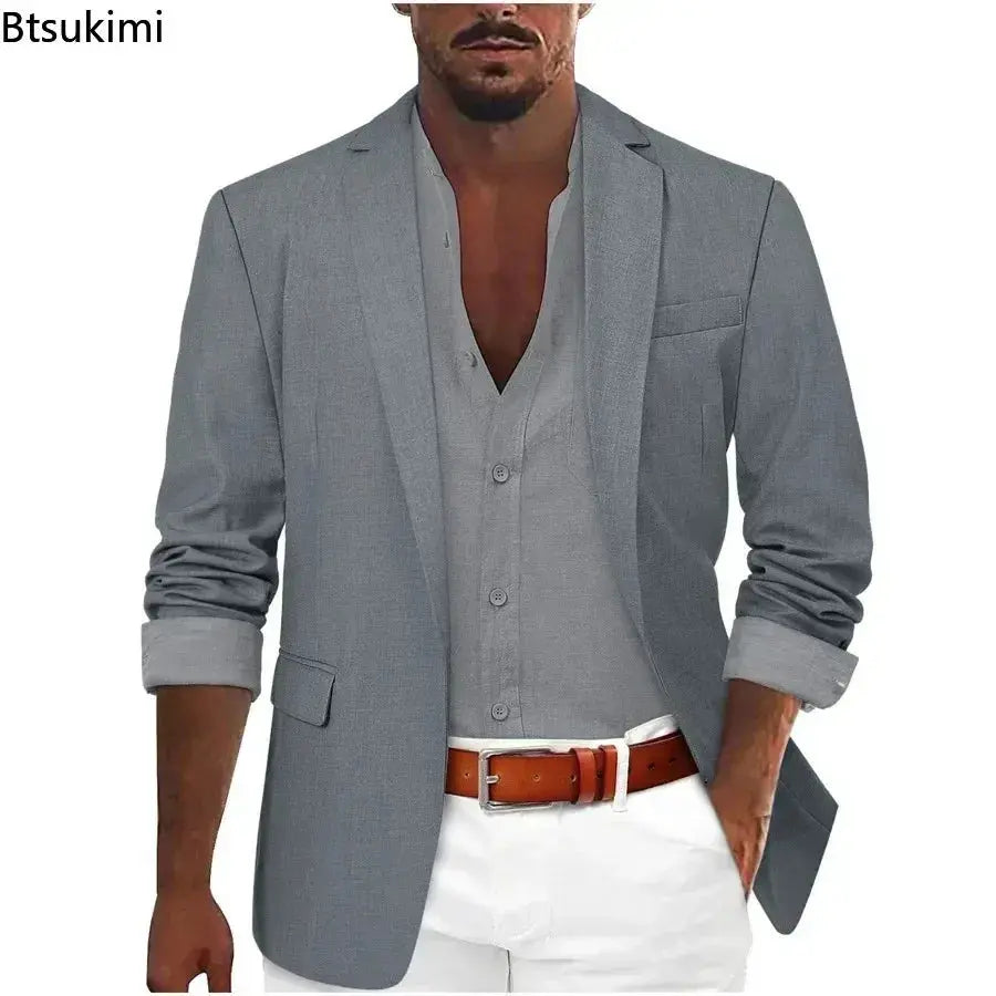 Close-up of single-button closure on tailored business blazer.