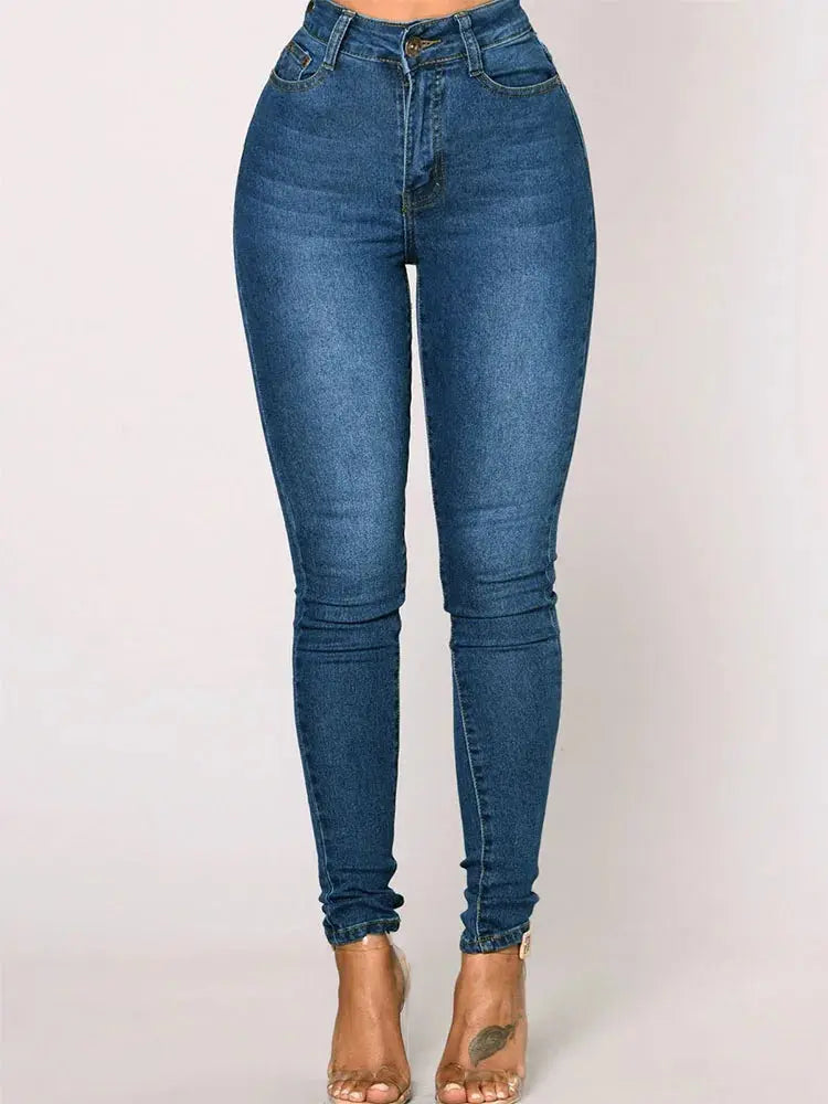 Model pairing light wash jeans with a stylish top for everyday wear.