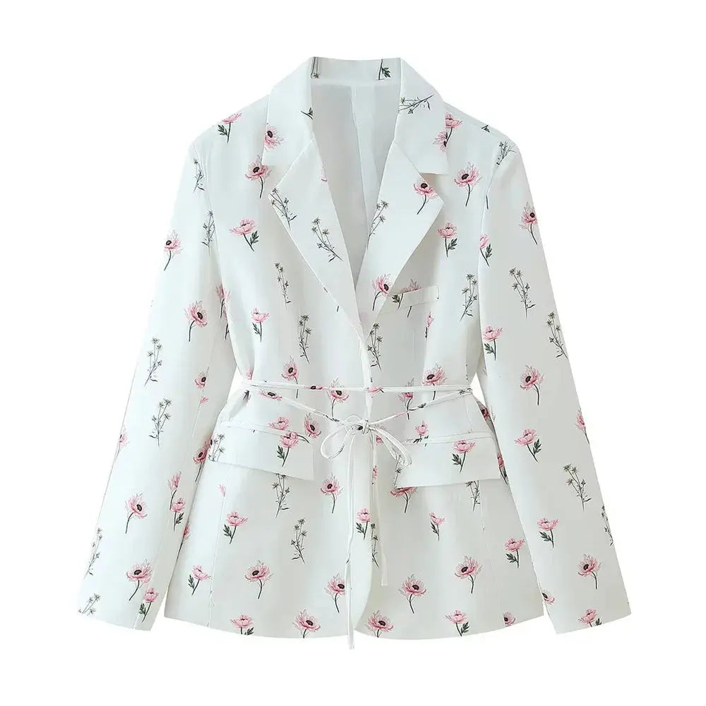 Side view of the Floral Whisper Belted Jacket, illustrating the lightweight fabric and cinched waist feature.