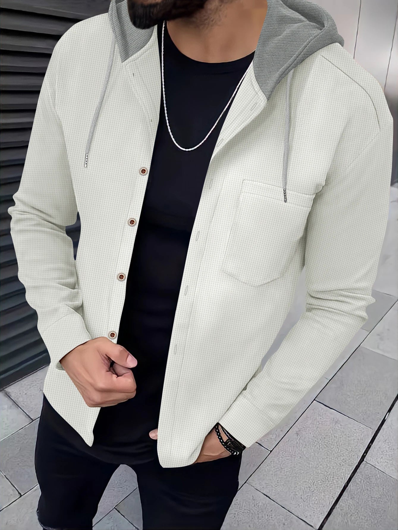 Integrated hood of the Autumn Whisper cardigan for added warmth and style.