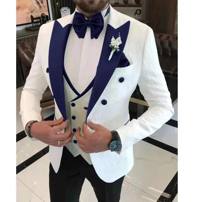 Floral wedding suit displayed on a mannequin, emphasizing its design.