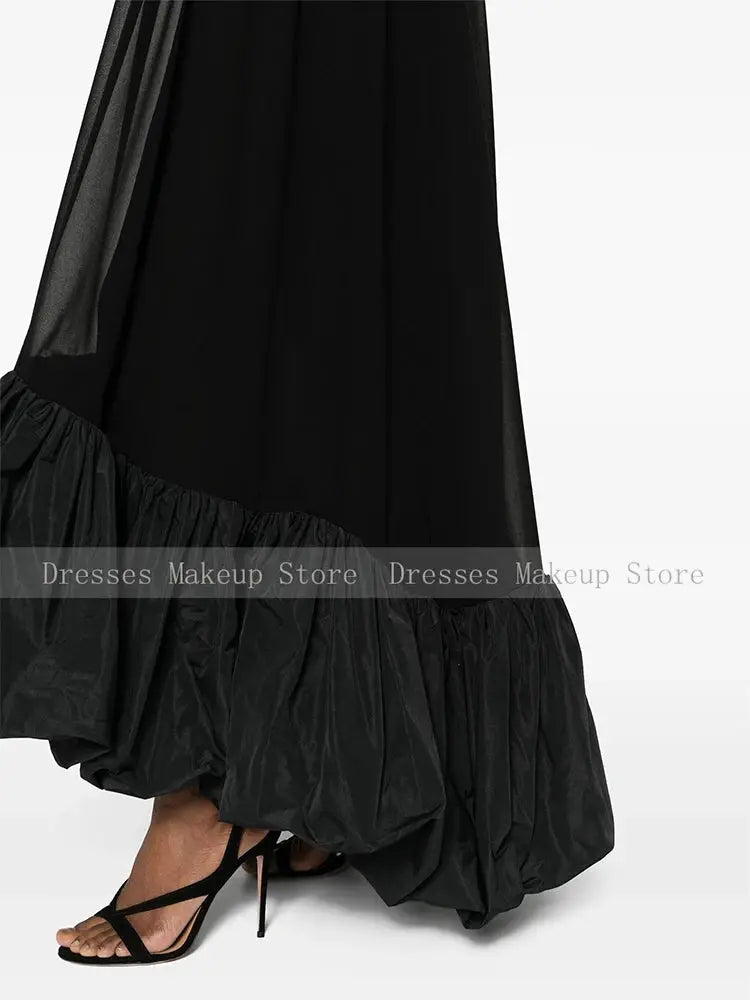 Full view of the bespoke black gala dress, perfect for grand ballroom occasions.