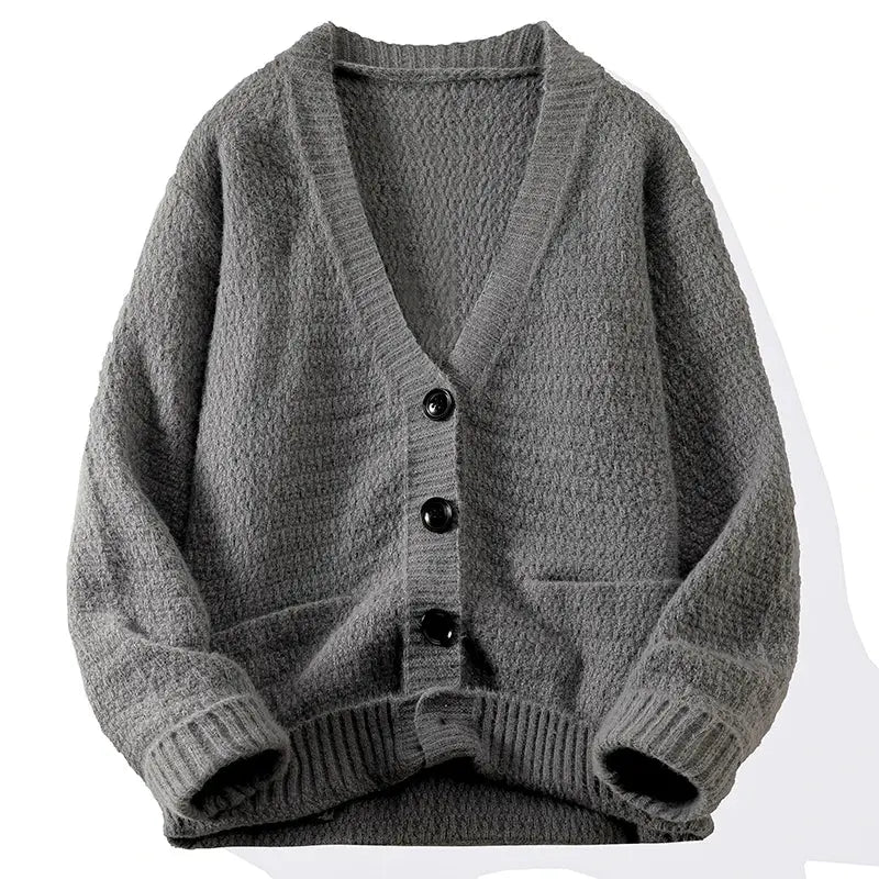 Autumn Whisper cardigan in soft beige, featuring a V-neck design and breathable knit fabric.